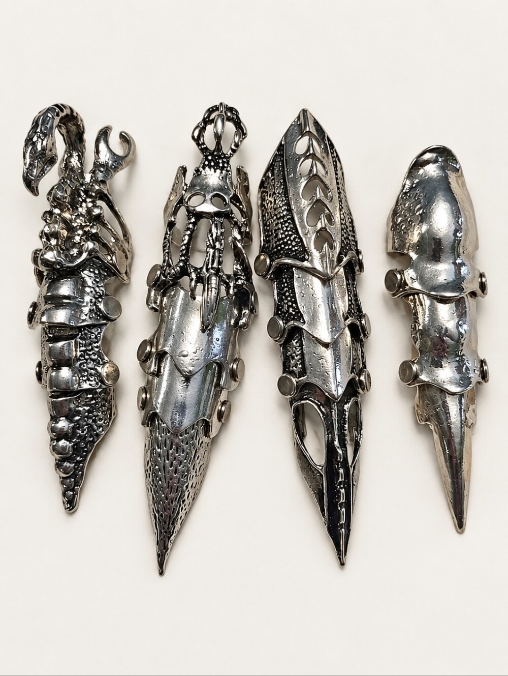 Set of 4 Silver-Tone Gothic Articulated Armor Claw Rings Costume Halloween